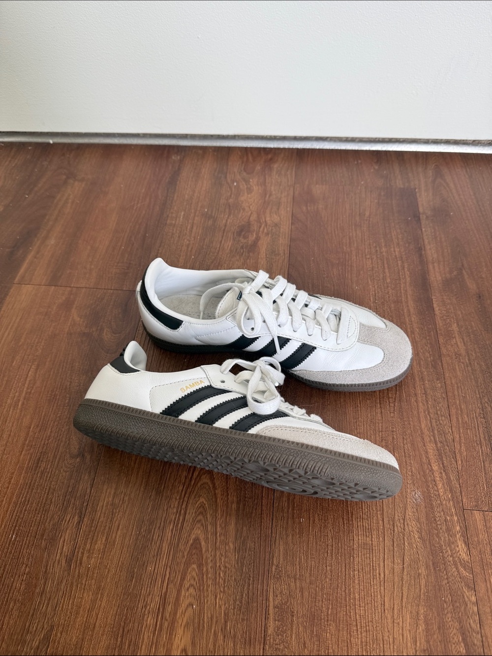 adidas white and black classic low-top sneakers